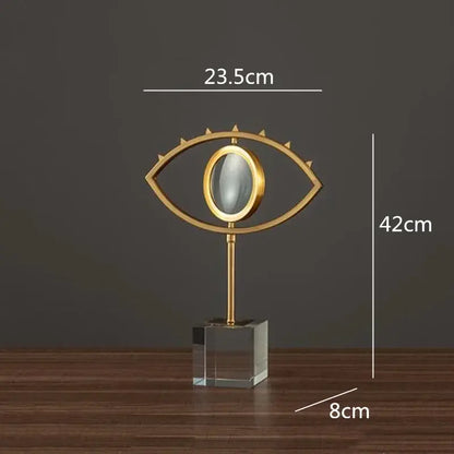 Modern gold metal eye magnifying glass with glass base living room decor