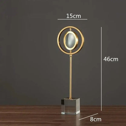 Modern gold metal eye magnifying glass with glass base living room decor