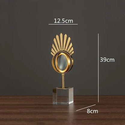 Modern gold metal eye magnifying glass with glass base living room decor