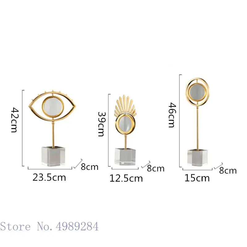 Modern gold metal eye magnifying glass with glass base living room decor