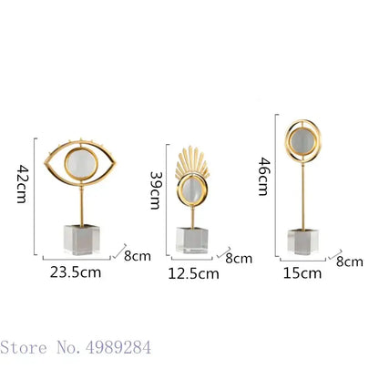 Modern gold metal eye magnifying glass with glass base living room decor