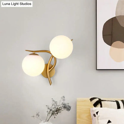 Modern gold milk glass orb sconce light bedroom wall fixture