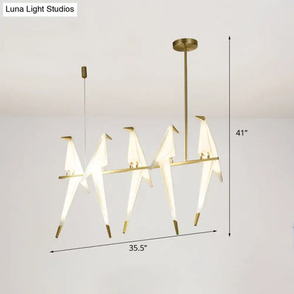 Modern gold origami bird pendant light for dining room decor