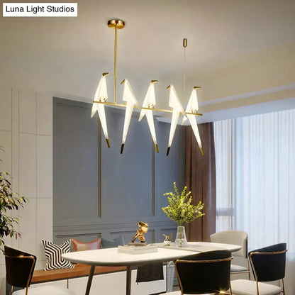 Modern gold origami bird pendant light for dining room decor