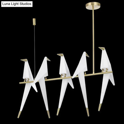 Modern gold origami bird pendant light for dining room decor