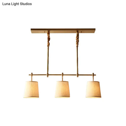 Modern gold pendant lamp with 3 fabric shades for dining rooms