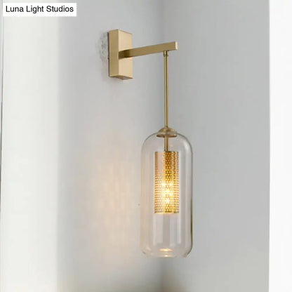 Modern gold perforated sconce with clear glass bedroom wall light
