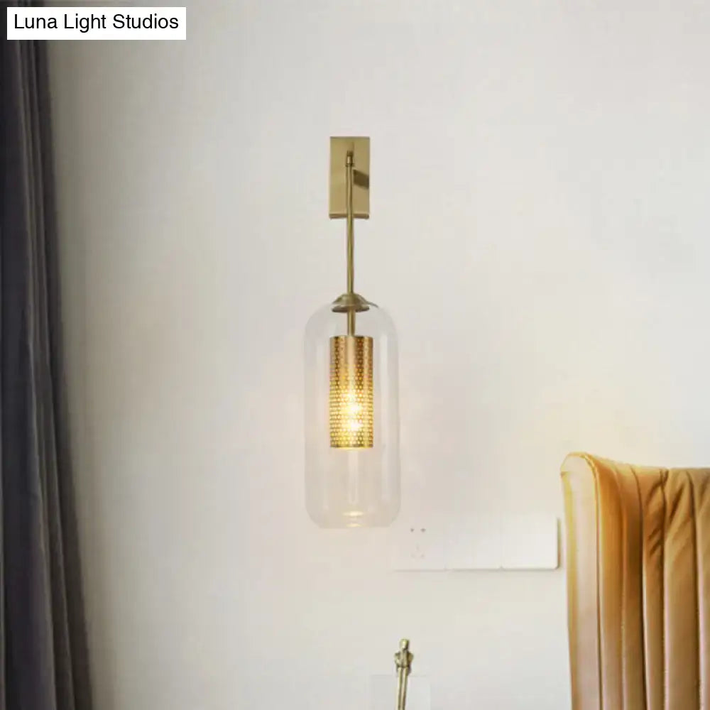 Modern gold perforated sconce with clear glass bedroom wall light