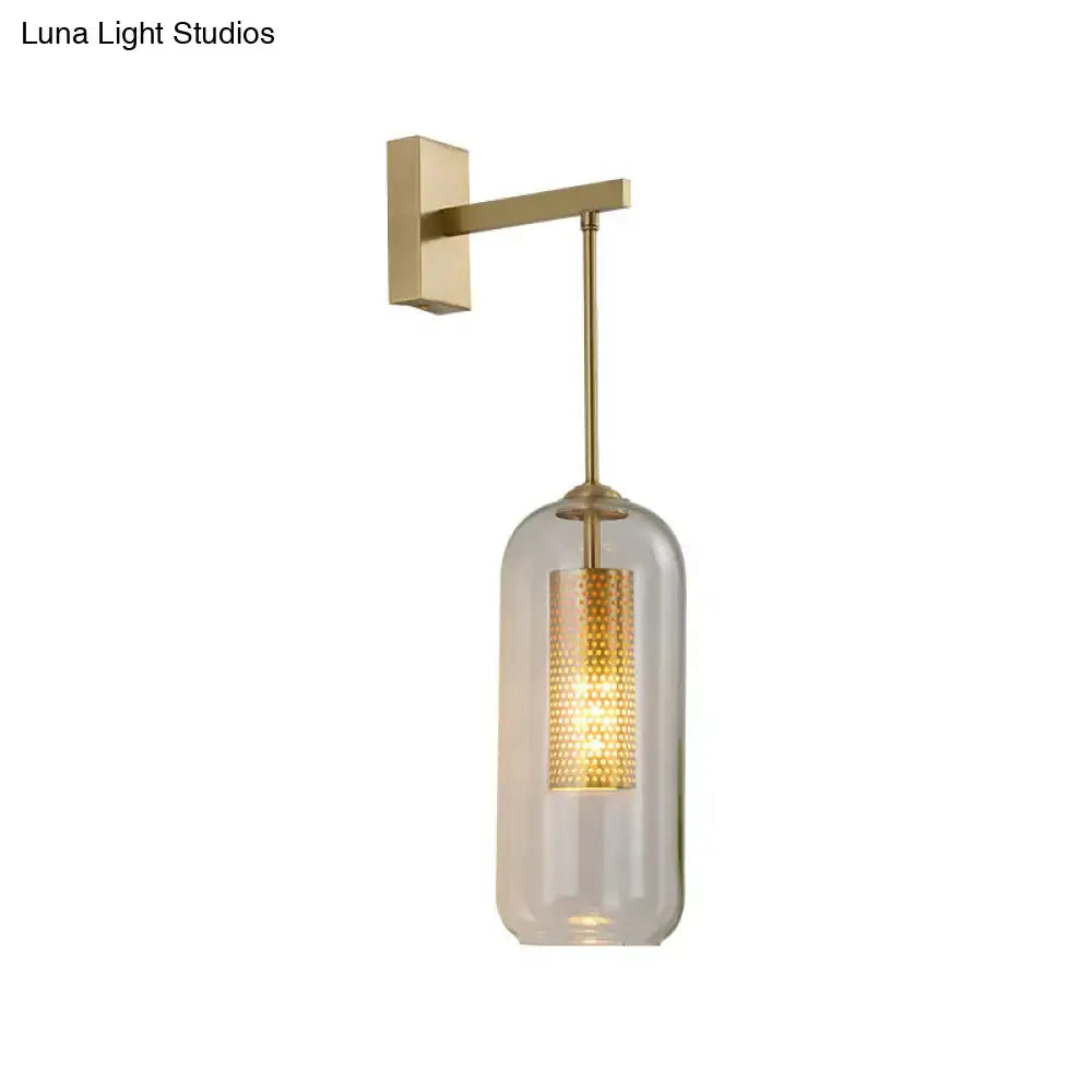 Modern gold perforated sconce with clear glass bedroom wall light