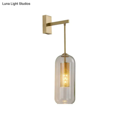 Modern gold perforated sconce with clear glass bedroom wall light