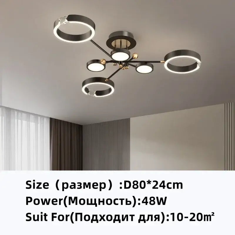 Modern gold plated chandelier with black arms for living room