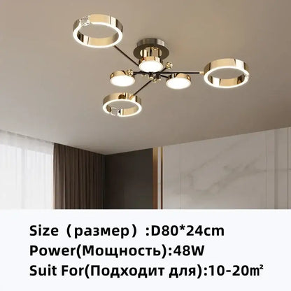 Modern gold plated chandelier with black arms for living room