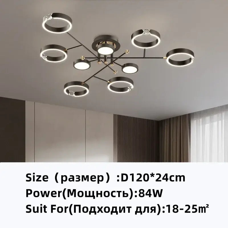 Modern gold plated chandelier with black arms for living room