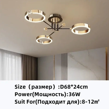 Modern gold plated chandelier with black arms for living room