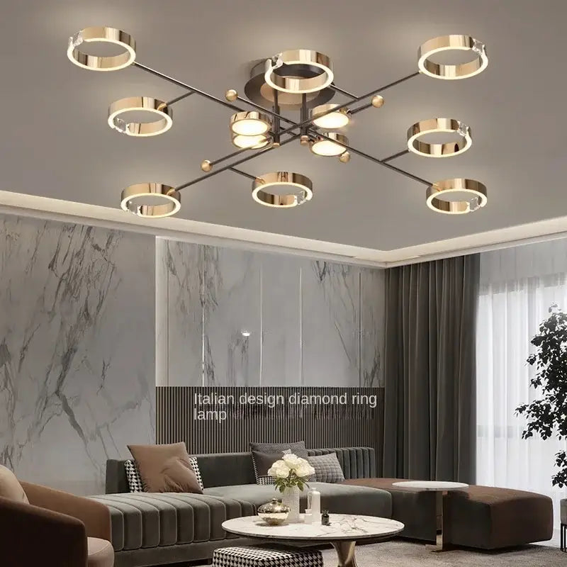 Modern gold plated chandelier with black arms for living room