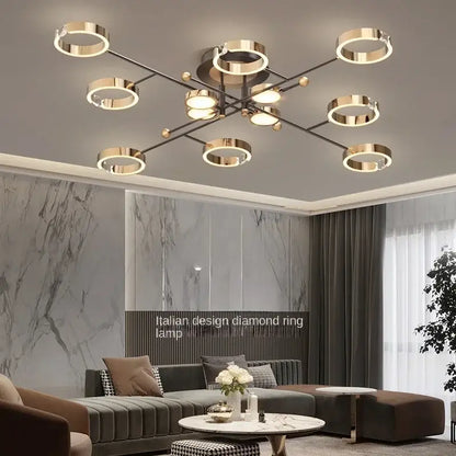 Modern gold plated chandelier with black arms for living room