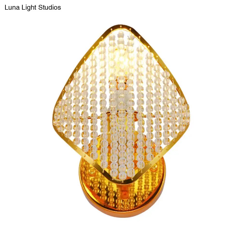 Modern gold rhombus wall light with clear crystal – bedroom sconce
