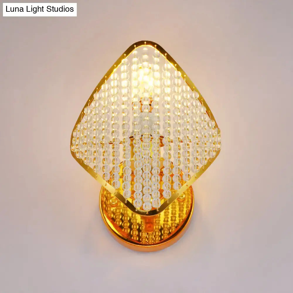 Modern gold rhombus wall light with clear crystal – bedroom sconce