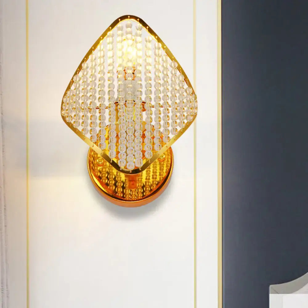 Modern gold rhombus wall light with clear crystal – bedroom sconce