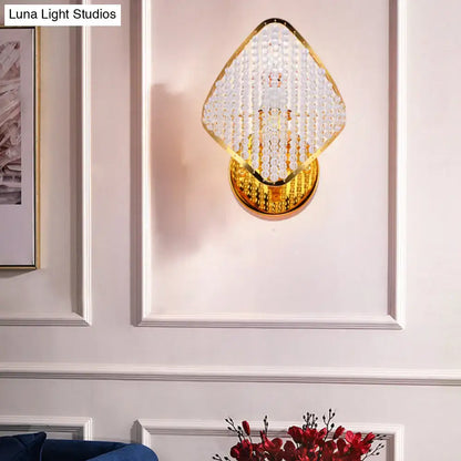 Modern gold rhombus wall light with clear crystal – bedroom sconce