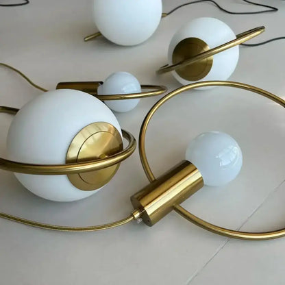 Modern gold ring pendant light with frosted glass for living room