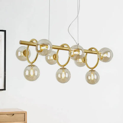 Modern gold round pendant dining room cognac glass linear design