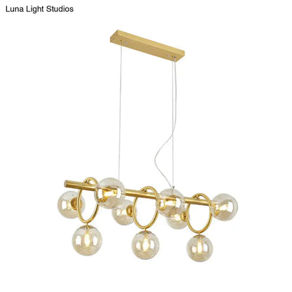 Modern gold round pendant dining room cognac glass linear design