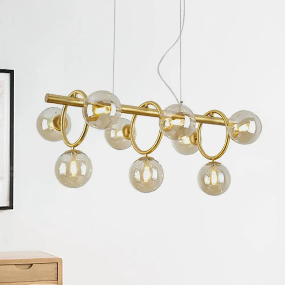 DecorBites™ Modern Gold Round Pendant Lighting - 9 Bulb Cognac Glass LED Island Lamp with Linear Design