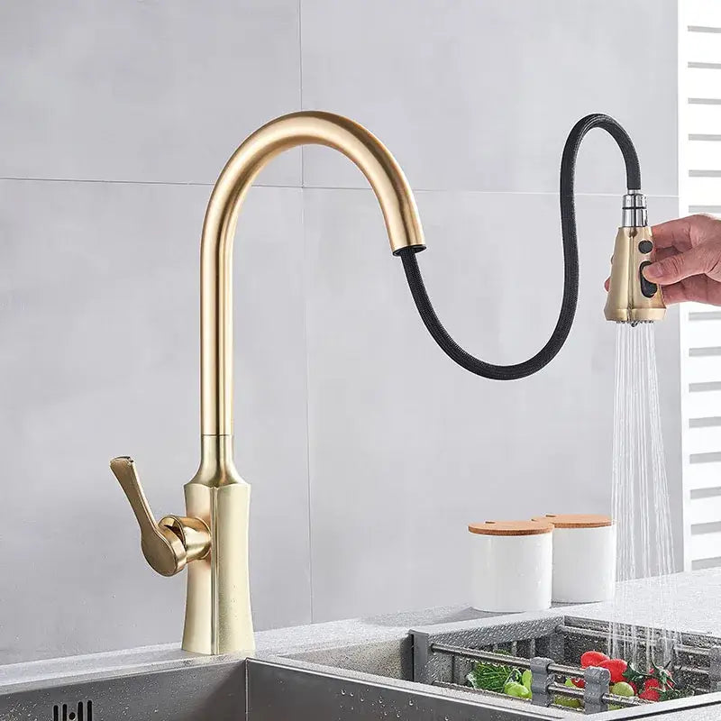 Modern gold single handle kitchen faucet with pull down sprayer