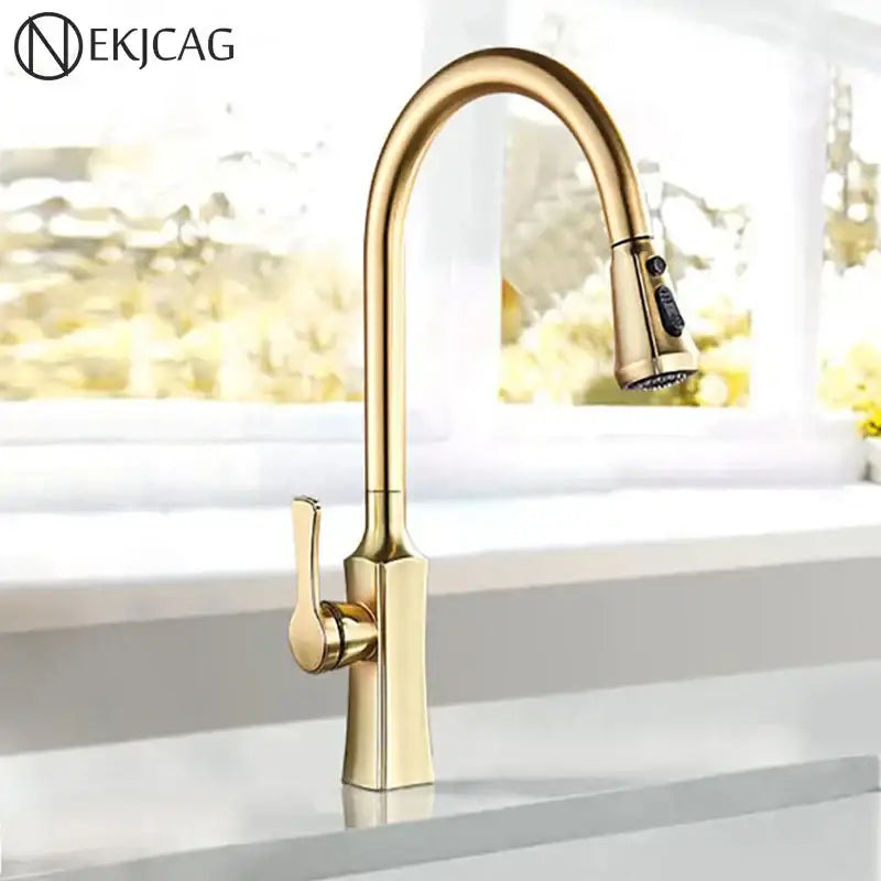 Modern gold single handle kitchen faucet with pull down sprayer