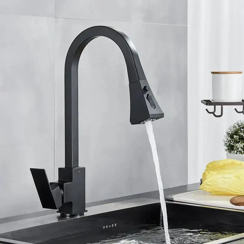 Modern gold single handle kitchen faucet with pull down sprayer