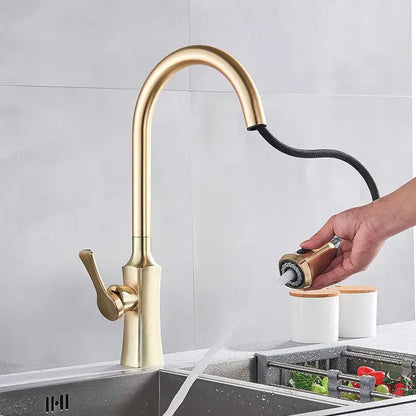 Modern gold single handle kitchen faucet with pull down sprayer
