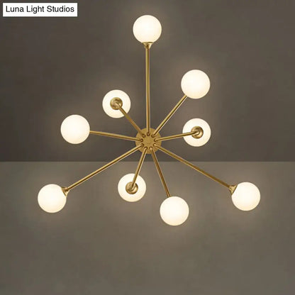 Modern gold sputnik chandelier with white glass shades living room