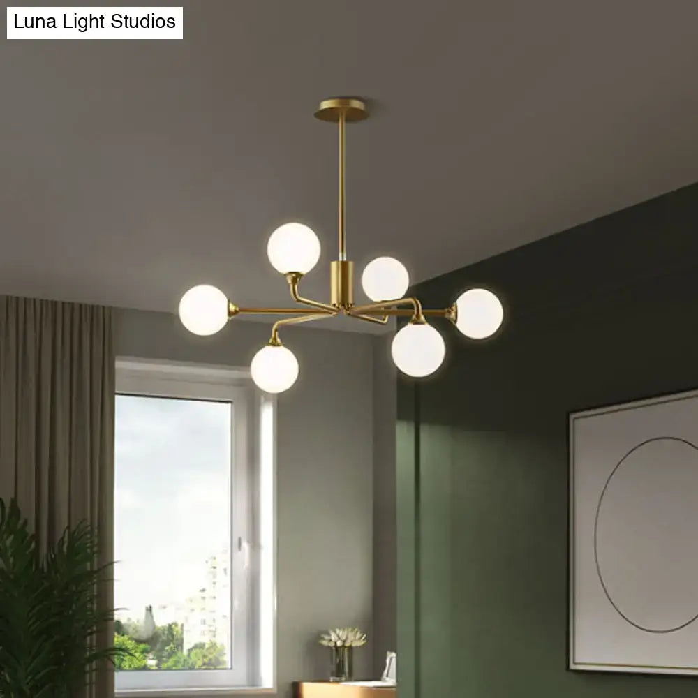 Modern gold sputnik chandelier with white glass shades living room