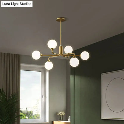 Modern gold sputnik chandelier with white glass shades living room