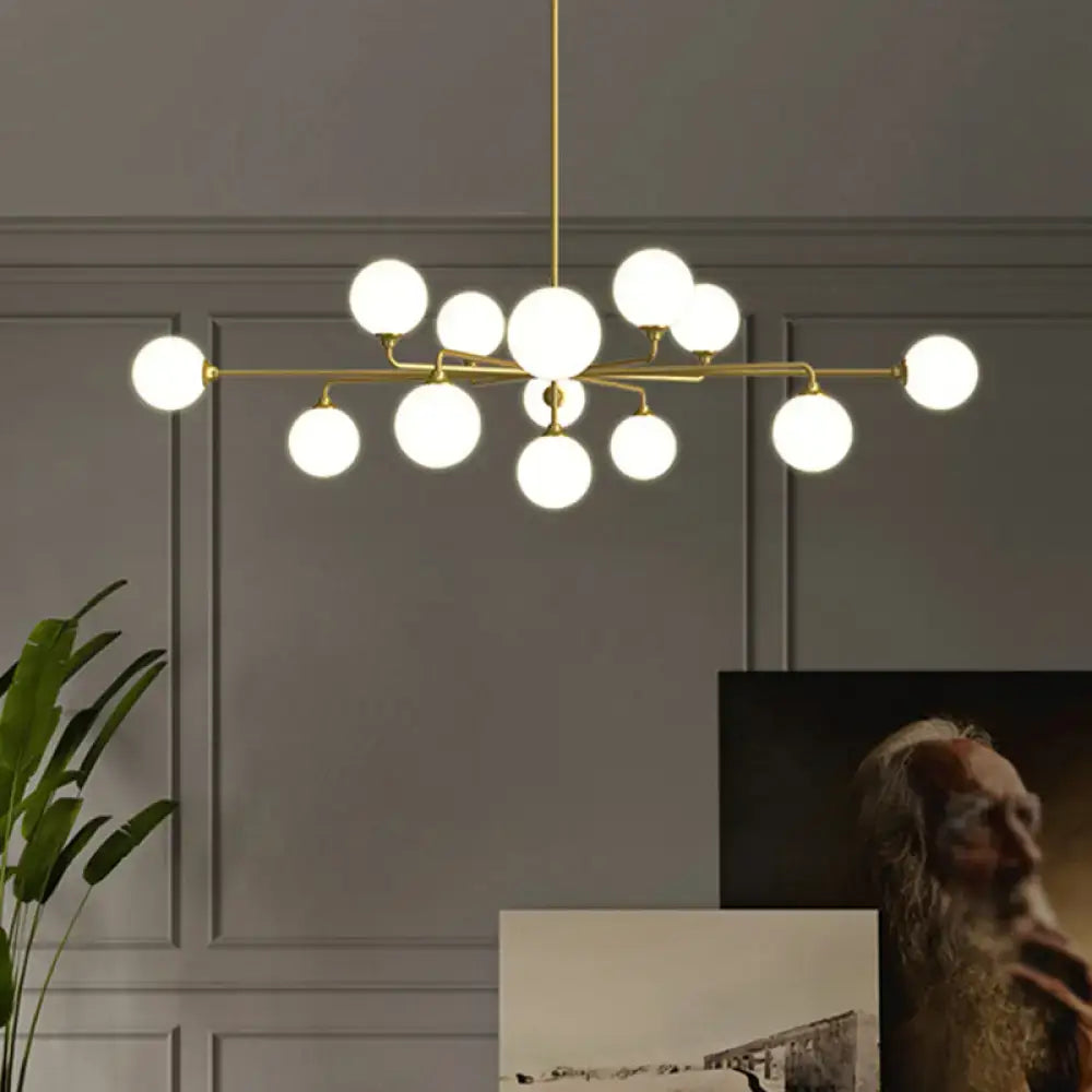 Modern gold sputnik chandelier with white glass shades living room