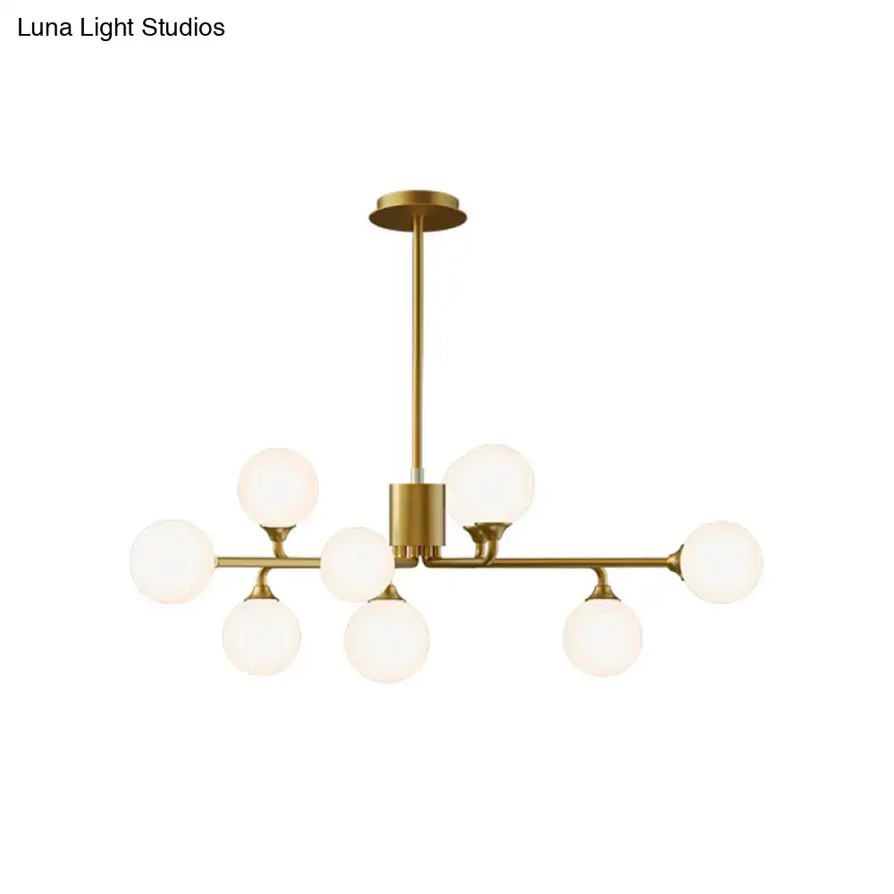 Modern gold sputnik chandelier with white glass shades living room