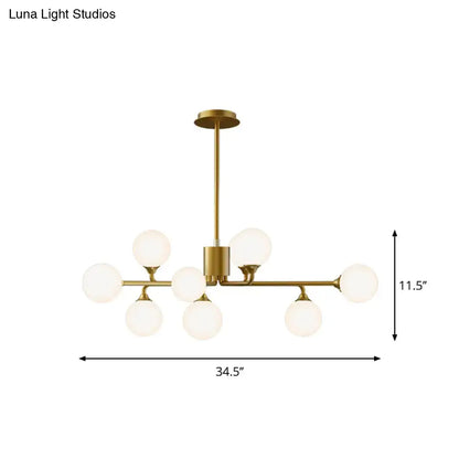 Modern gold sputnik chandelier with white glass shades living room