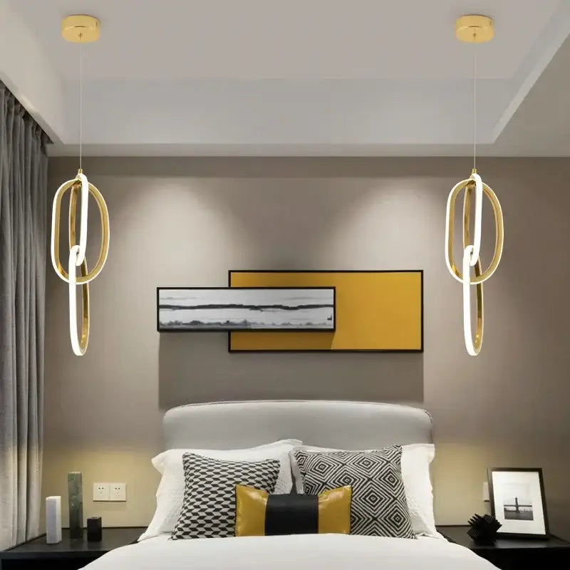 Modern gold steel pendant light interlocking rings dining room