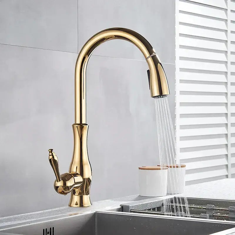 Modern gold swivel kitchen faucet with pull down sprayer