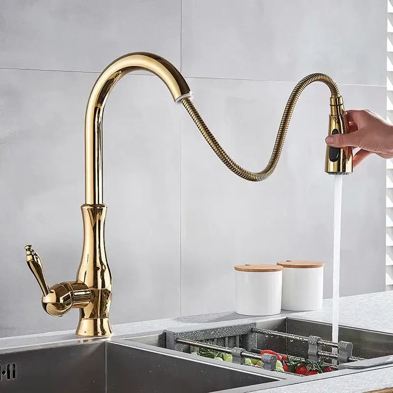 Modern gold swivel kitchen faucet with pull down sprayer