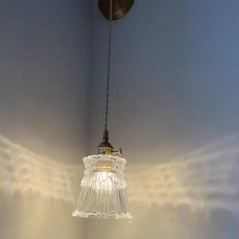 Modern gold wall lamp with clear glass shade – bedroom pull chain