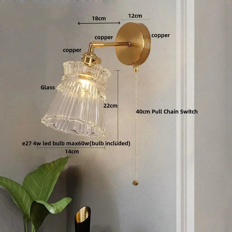 Modern gold wall lamp with clear glass shade – bedroom pull chain