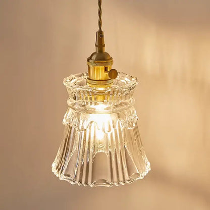Modern gold wall lamp with clear glass shade – bedroom pull chain