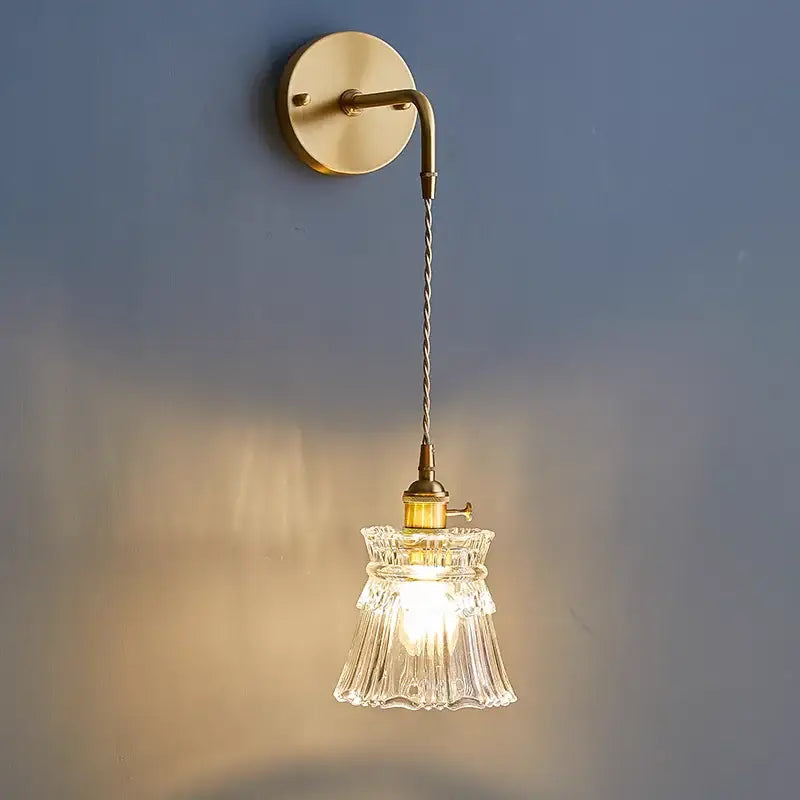 Modern gold wall lamp with clear glass shade – bedroom pull chain