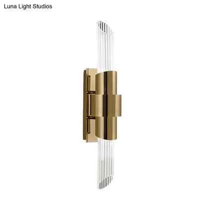 Modern gold wall lamp with prismatic crystal shade for bedroom