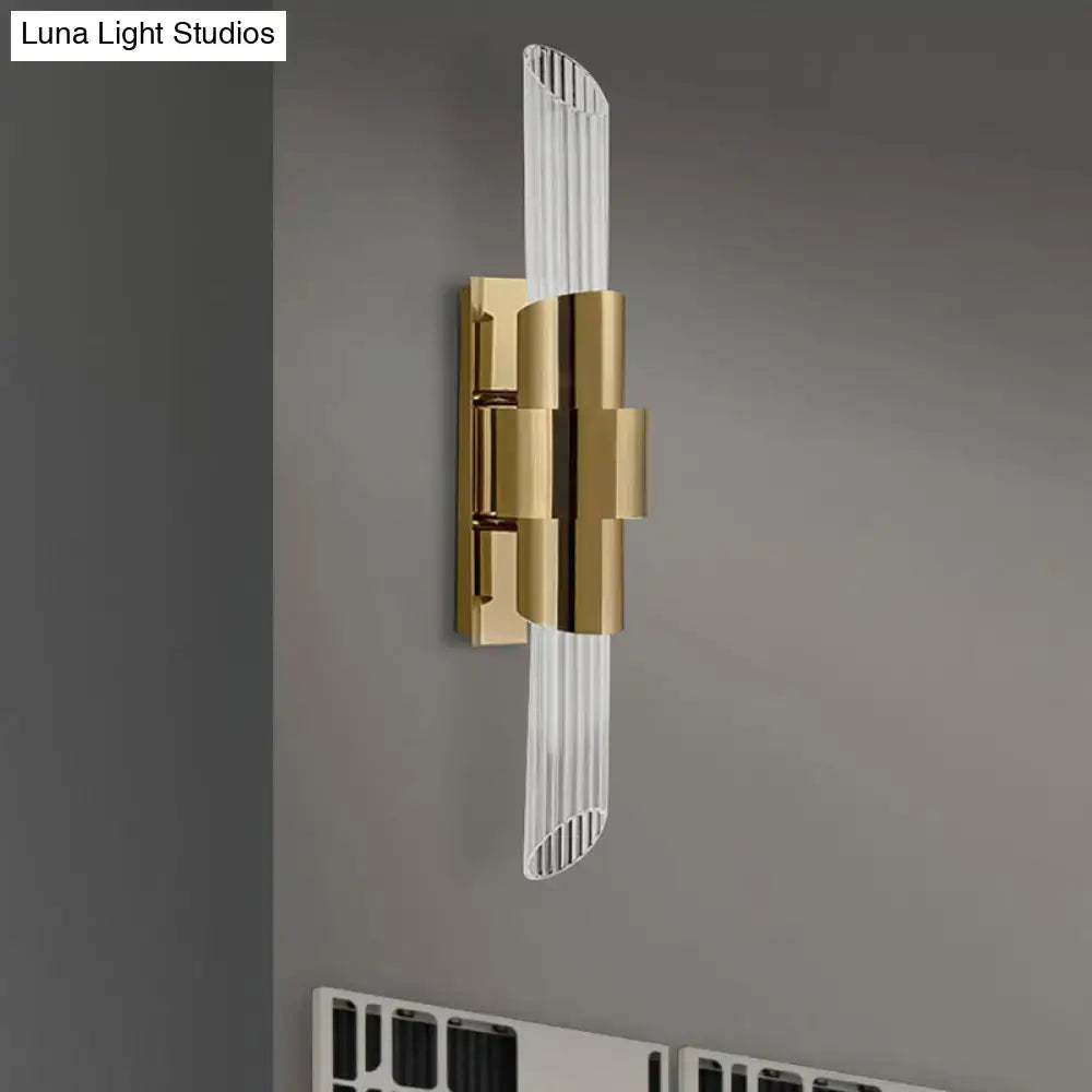 Modern gold wall lamp with prismatic crystal shade for bedroom