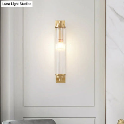 Modern gold wall light fixture with frosted glass for living room
