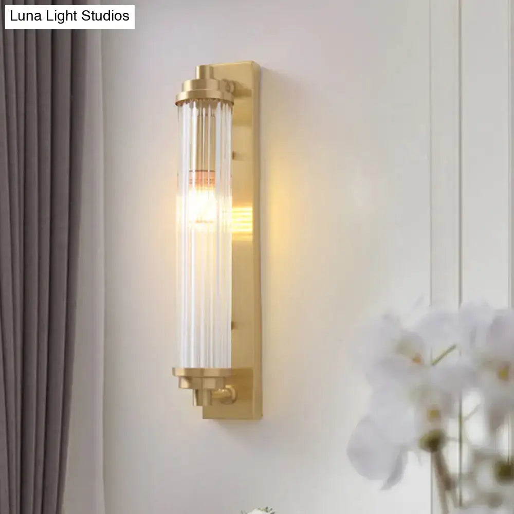 Modern gold wall light fixture with frosted glass for living room