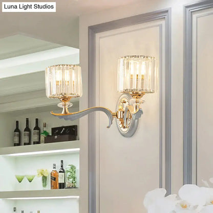 Modern gold wall light with clear crystal shade – living room sconce